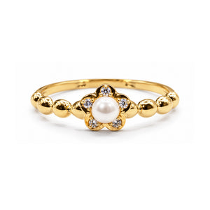Sortija de oro 18k con perla central rodeada de circonitas