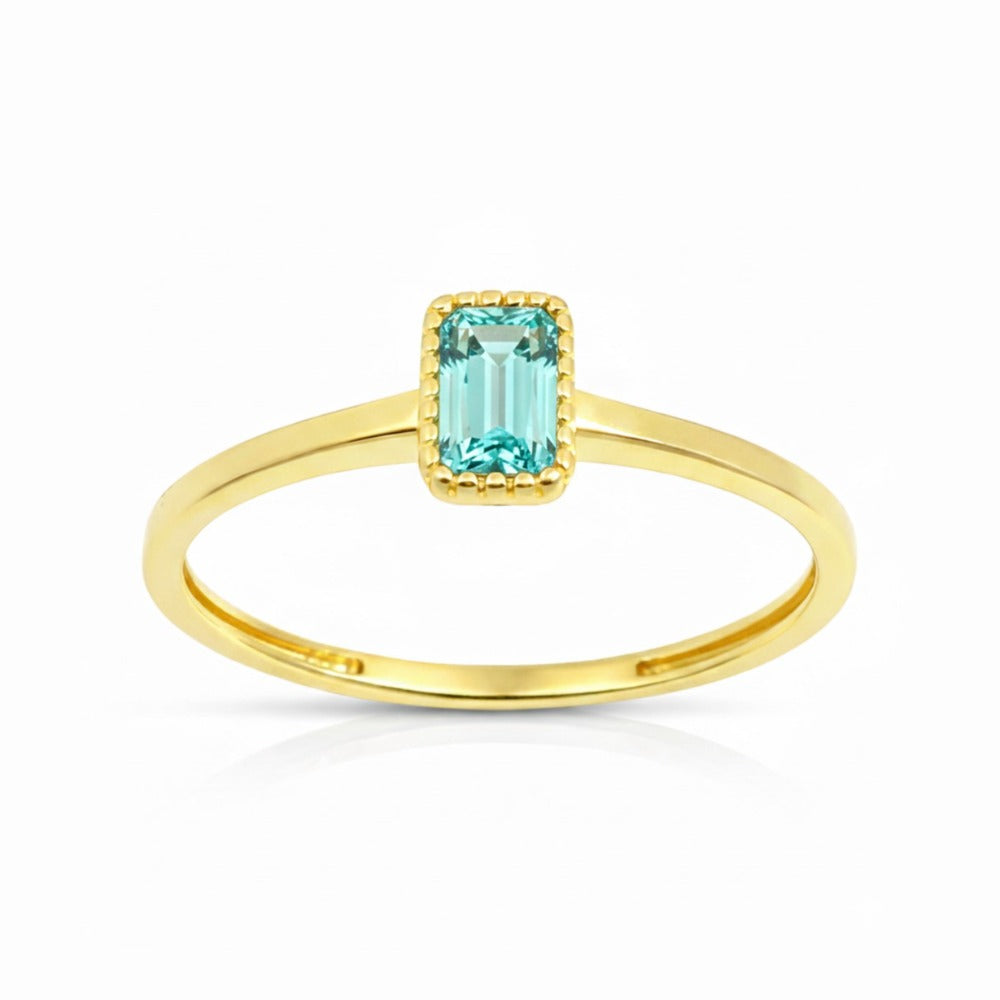 Anillo oro 9k circonita color aguamarina