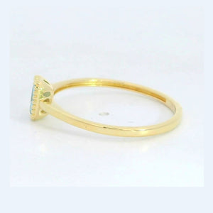 Anillo oro 9k circonita color aguamarina