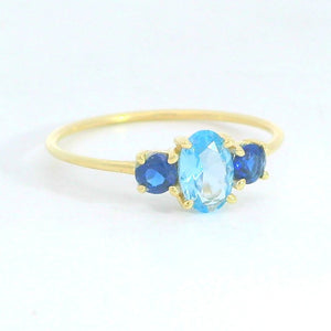 Anillo oro 9k circonita aguamarina y zafiro nano