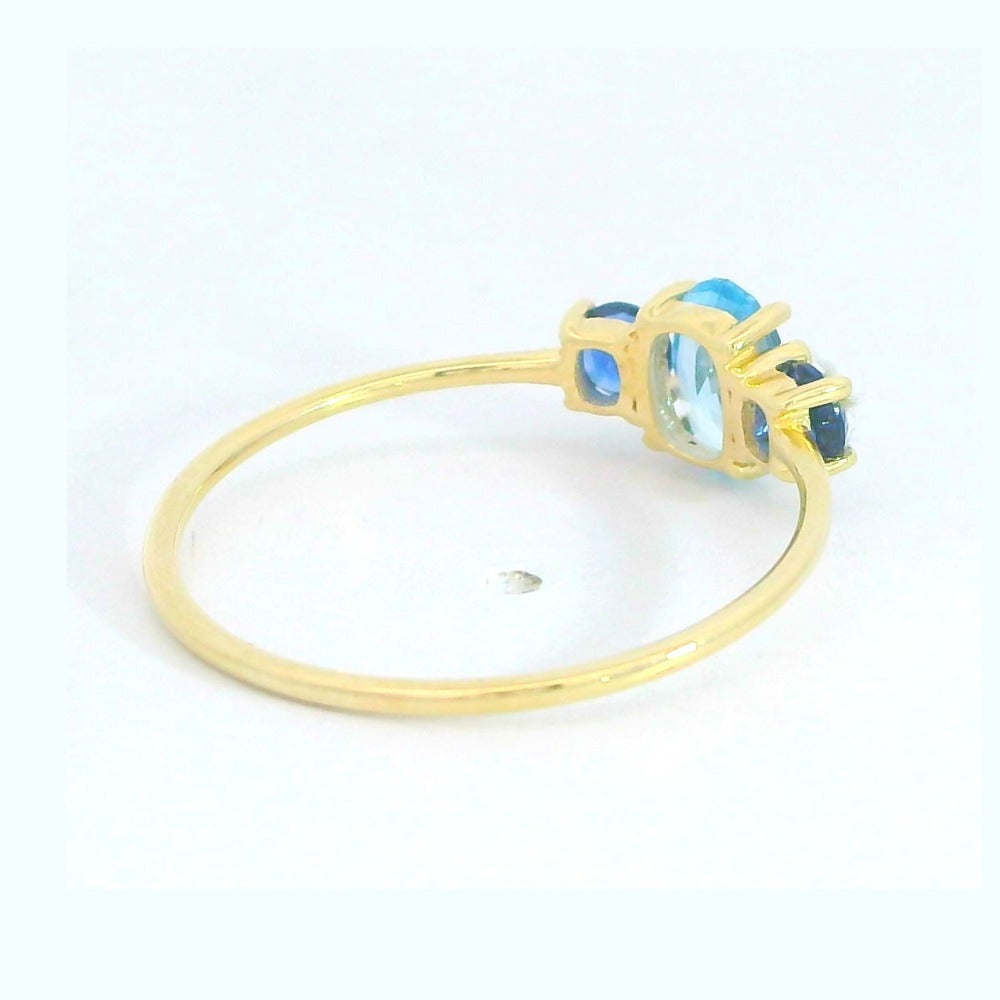 Anillo oro 9k circonita aguamarina y zafiro nano