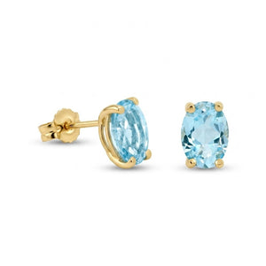 Pendientes oro 9k topacio azul oval