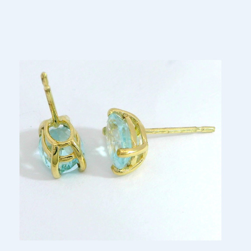 Pendientes oro 9k topacio azul oval
