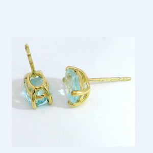 Pendientes oro 9k topacio azul oval