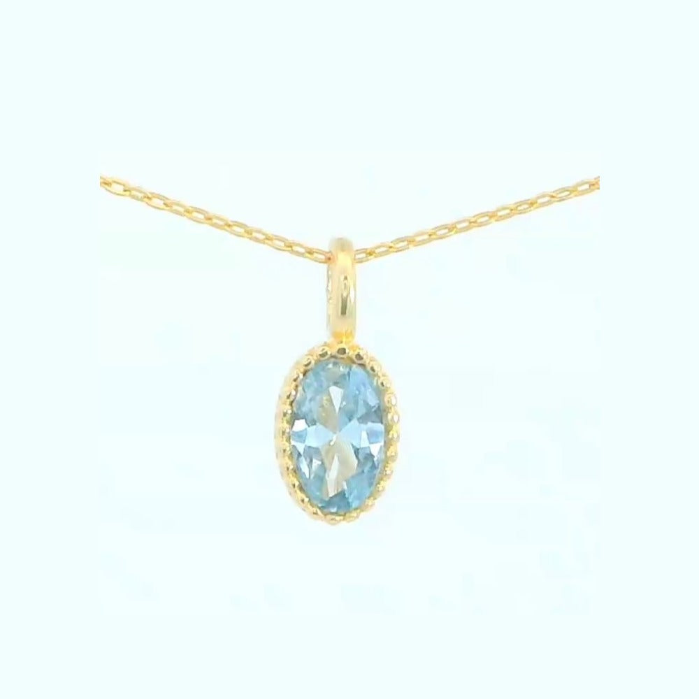 Colgante oro 9k circonita color aguamarina