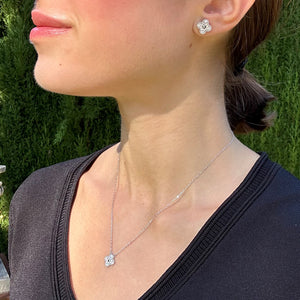 Pendientes y colgante de plata de ley en forma de pétalos con circonitas chica