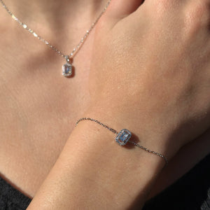 Pulsera de plata de ley 925 con circonita rectangular color aguamarina orlada