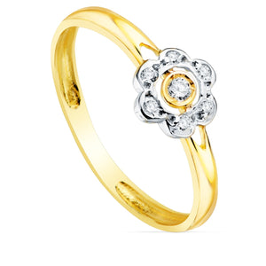 Anillo de oro de ley 18k bicolor para niña de comunión con motivo de flor con circonitas. El motivo de la flor mide 6x6mm y el aro mide 2mm. Todos se envían con certificado de autenticidad.