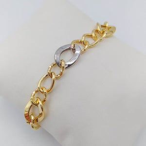 Pulsera oro anillas bicolor detalle