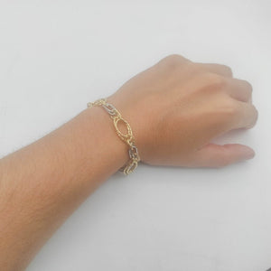 Pulsera bicolor oro doble mano